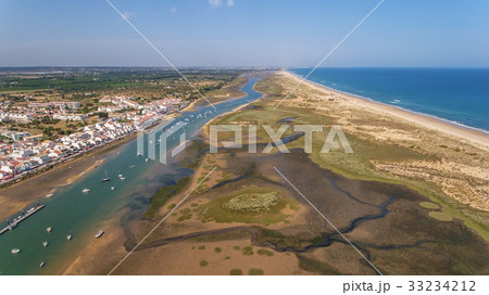 Aerial. Ria Formsa Tavira is filmed from the sky Aerial. Ria Formsa Tavira is filmed from the sky 33234212
