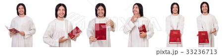 Young priest with bible isolated on white Young priest with bible isolated on white 33236713