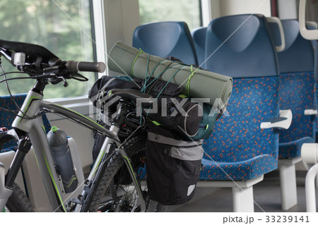 Mountain bike is transported in the train. 33239141