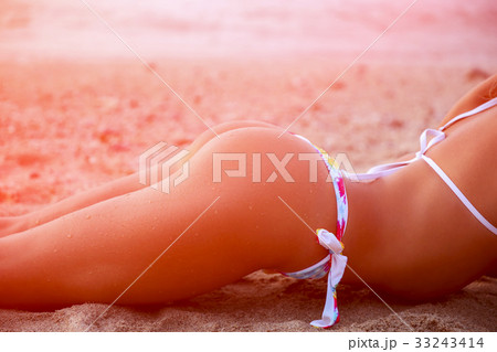 Sporty young beautiful woman in bikini. Toned Sporty young beautiful woman in bikini. Toned 33243414