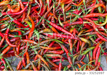 Top view red fresh hot chili peppers background. 33252097