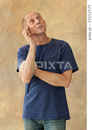 Worried mature man touching his head. 33252575