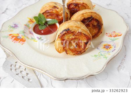 mini pizza rolls on vintage serving plate mini pizza rolls on vintage serving plate 33262923