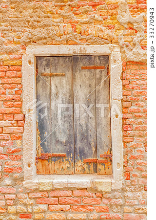 Window in old town and texture of a brick 33270943