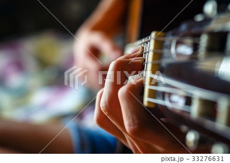 musician playing acoustic guitar, music background musician playing acoustic guitar, music background 33276631