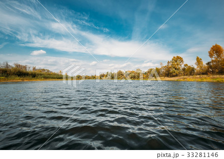 Autumn Nature Landscape With Rippled Water Surface Autumn Nature Landscape With Rippled Water Surface 33281146