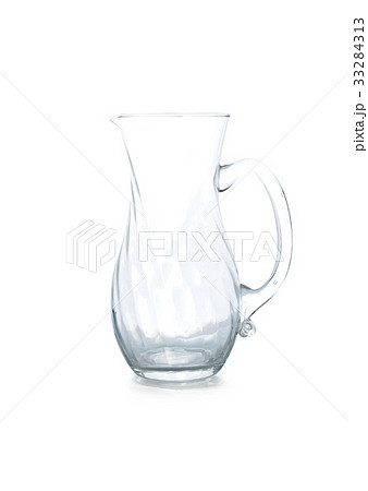 Empty glass jar on a white background. Empty glass jar on a white background. 33284313