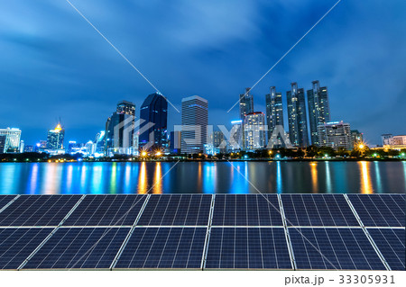 Solar panel with city night light background. 33305931