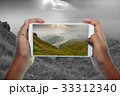 Travel concept, take photography fog and mountain 33312340