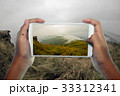 Travel concept, take photography fog and mountain 33312341