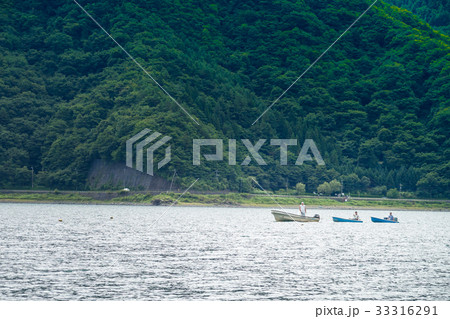 釣り人と西湖 33316291