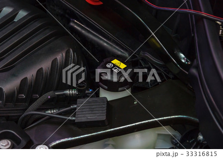 Car engine brake fluid container close-up Car engine brake fluid container close-up 33316815