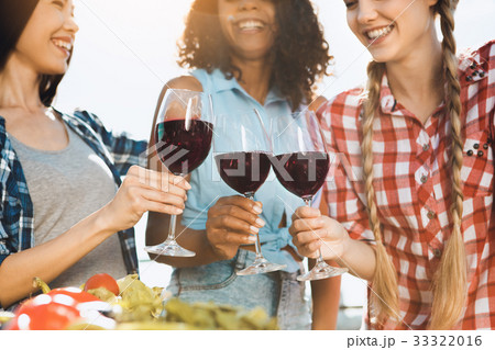Group of friends having barbecue party on the roof Group of friends having barbecue party on the roof 33322016