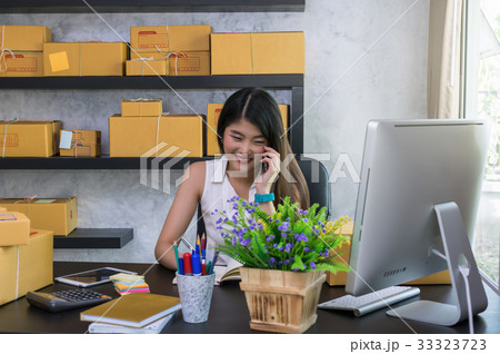 Young asian teenager owner business woman work at home for online shopping, calling and writing the order of product with office equipment, entrepreneur and alpha generation life style concept Young asian teenager owner business woman work at home for online shopping, calling and writing the order of product with office equipment, entrepreneur and alpha generation life style concept 33323723