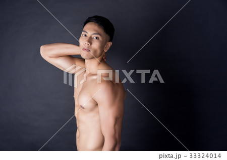 portrait of fitness man posing on black background 33324014