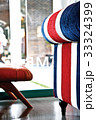 Side of red white blue strip sofa in living room 33324399