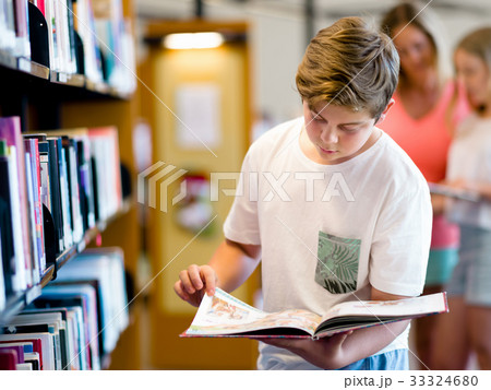Boy in library Boy in library 33324680