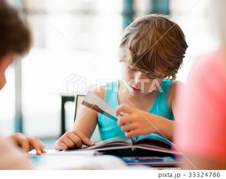 Boy in library Boy in library 33324786