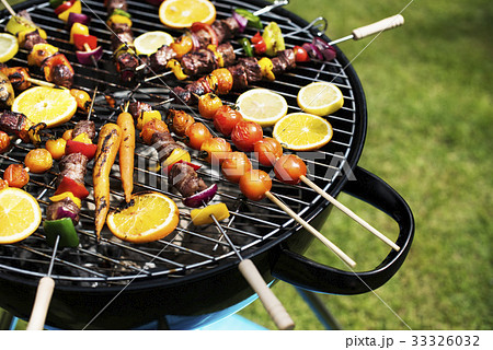 Closeup of barbecues steaks on the charcoals grill 33326032