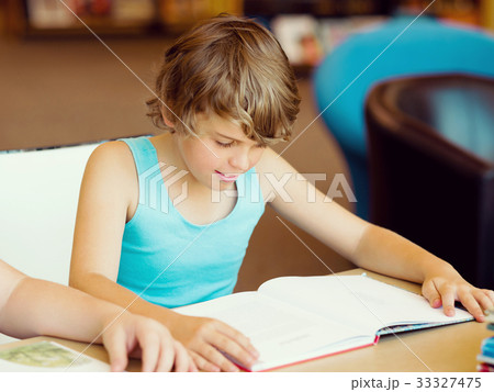 Boy in library Boy in library 33327475