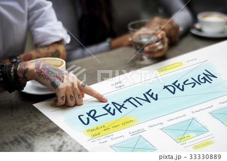 Workers working on banner network graphic overlay on table 33330889