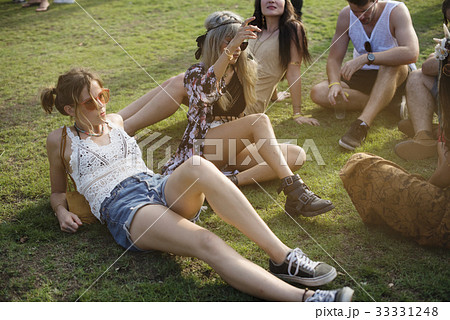People Enjoying Talking Together at Music Concert Festival People Enjoying Talking Together at Music Concert Festival 33331248