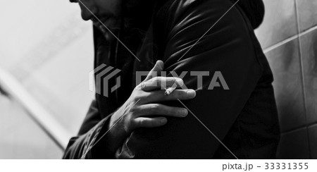 A lonely suffering man smoking 33331355