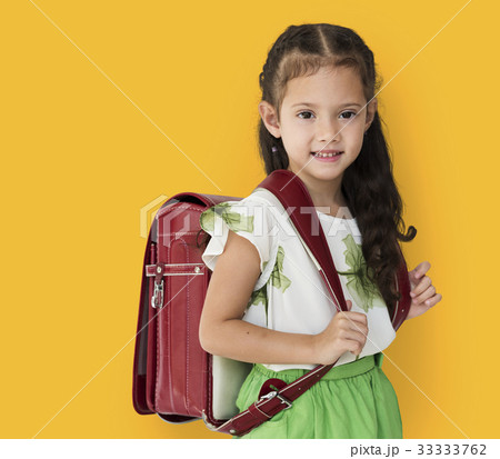 Young asian kid student with a backpack portrait Young asian kid student with a backpack portrait 33333762
