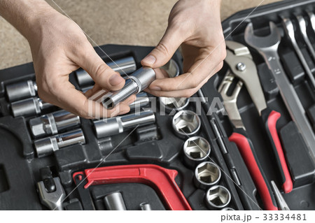 Open toolbox and male hands 33334481