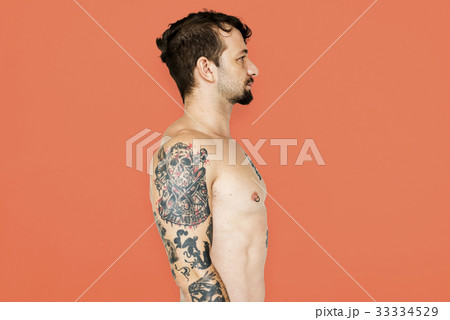 Adult man with tattoo bare chest 33334529