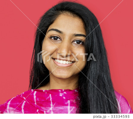 Young woman smiling studio photo Young woman smiling studio photo 33334593