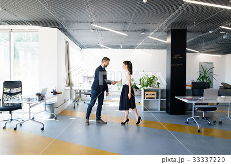 Business people in the office. Man and woman Business people in the office. Man and woman 33337220