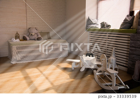 Wooden toy airplane and horses on the floor Wooden toy airplane and horses on the floor 33339539