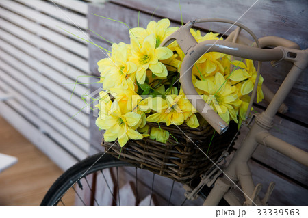 Close-up of yellow flowers in a basket on  33339563