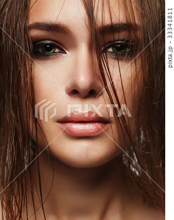 Beautiful woman with wet hair and make-up 33341811