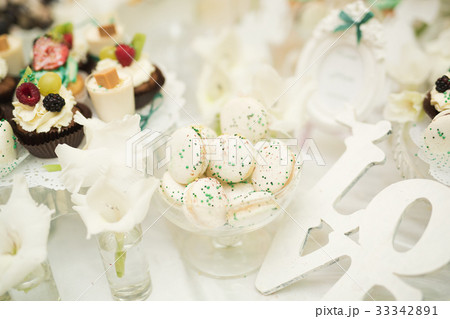 French sweet colorful macarons background, close 33342891