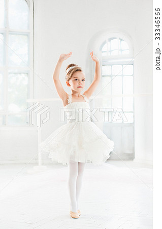 Little ballerina girl in a tutu. Adorable child 33346566