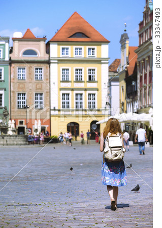 girl walk at the main square Rynek of Poznan 33347493