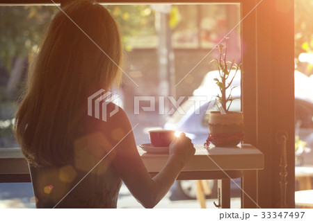 girl with the cup of coffee 33347497