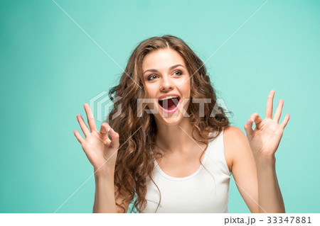 The young woman's portrait with happy emotions 33347881