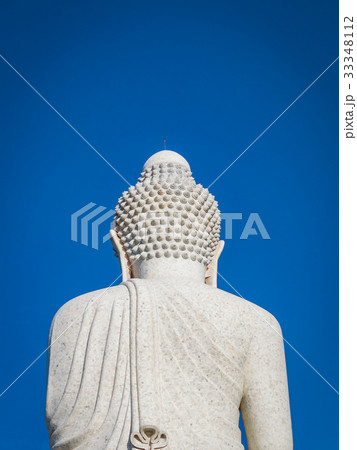 Back view of the white marble statue of Big Buddha 33348112