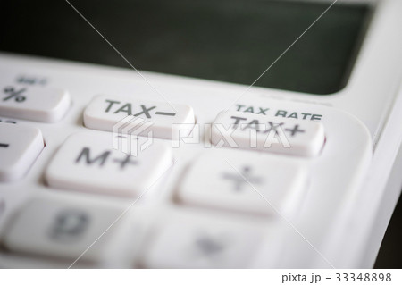 Close up of tax button  business white calculator 33348898