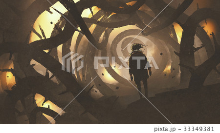 man walking in mystery forest with thorny trees 33349381