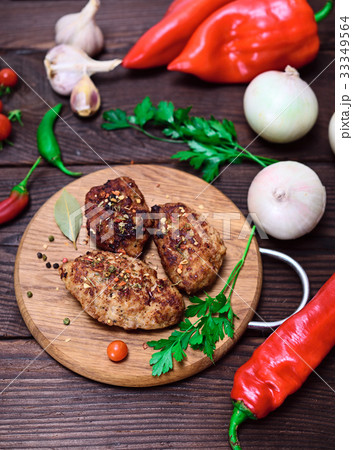 Three meat cutlets with spices Three meat cutlets with spices 33349564