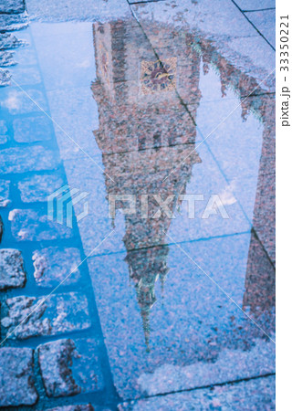 Reflection of City Hall Tower in a puddle. Hamburg Reflection of City Hall Tower in a puddle. Hamburg 33350221