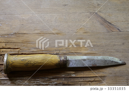 traditional Finnish knife puukko on  a wooden 33351035