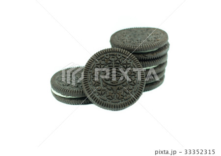 Chocolate cookies with creme filing isolated  33352315