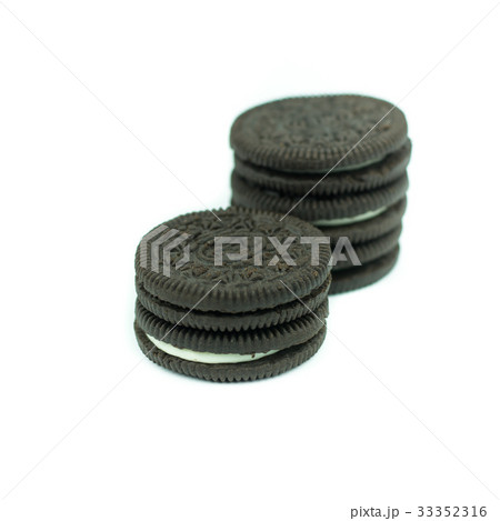 Chocolate cookies with creme filing isolated 33352316