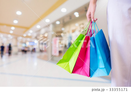 Woman with shopping bags. 33355171