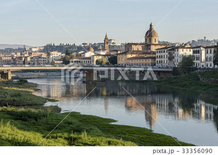 Italy, Tuscany, Florence, Cityscape reflected in Arno river 33356090